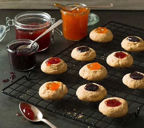 recipe image Raspberry Linzer Thumbprint Cookies